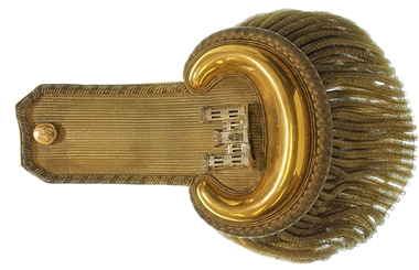 A decorative gold epaullete